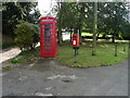 Elizabeth II postbox and telephone box on High Street, Eccleshall