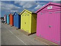 Colourful beach huts on Seaford Esplanade