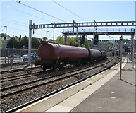 ST3088 : End of a long freight train passing through Newport station by Jaggery