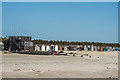 SZ7698 : Beach huts by Ian Capper