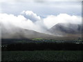 Q8114 : Cabbage field and rain over the Dingle Peninsula by Jonathan Thacker