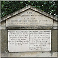 Plaques above the entrance to the former graveyard, Cross Street