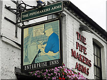 TQ0483 : Signs for the Pipemakers Arms, Rockingham Road by Mike Quinn