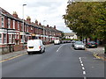 Houses and cars on Gloucester Road, looking north