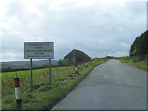 SK0267 : Flash village boundary sign. The highest village in England by Colin Pyle