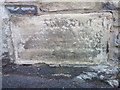 Inscribed stone (2) in wall on Halkyn Street, Holywell