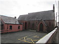 Yellow-marked parking area outside All Saints Church, Buckley