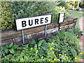 TL9033 : Bures Railway Station sign by Geographer