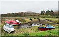 Small boats at the shore of Strachur Bay