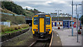 Barrow bound DMU waiting to depart Whitehaven Station