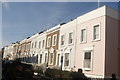 TQ2580 : View of coloured houses on Kensington Place by Robert Lamb