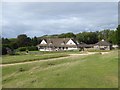 The clubhouse of Cleeve Hill Golf Club