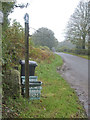 Boundary stone opposite Cleeve Hill Farm