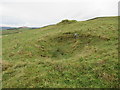 Rocky pit and bump above Earlside near Hawick