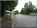 Bus stop and shelter on Cheltenham Road (A435), Stratton