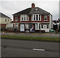 Adverts on a bus shelter alongside the A470, Whitchurch, Cardiff