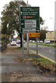 Dark green directions sign alongside the A470, Cardiff