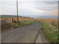 Minor road at Glenquithle descending towards Pennan Bay