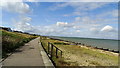 View SW along coastal path at Seasalter