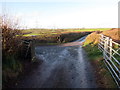 SN3914 : Cyffordd o heolydd mynedfa / Junction of access roads by Alan Richards
