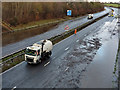 Clearing up flooding on M23