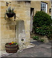 Grade II Listed milestone outside Milestone House, Broadway, Worcestershire