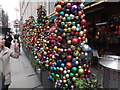 View of bauble Christmas trees outside The Ivy restaurant on Broadwick Street #2