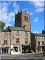 Church tower and shops