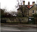 Telecoms cabinet and a bench, Templeway West, Lydney