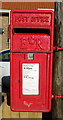 TA2925 : Elizabeth II postbox on Winestead Lane by JThomas