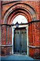 TQ3103 : Door of St Mary's, Rock Gardens by Tiger