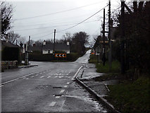 SN3652 : The A487 road running through Plwmp by John Lucas