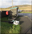 Bus shelter, bench and postbox on a Pantyffordd corner