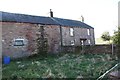 House and farm building at Highbarn on south side A66