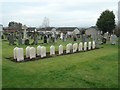NX9875 : Commonwealth war graves, from the south by Christine Johnstone