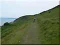 SN4461 : Walkers (and dog) heading towards Aberaeron on the Wales Coast Path by Eirian Evans