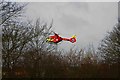 Air Ambulance taking off from field adjacent to Flax Crescent, Carterton, Oxon