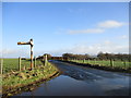 Old signpost at rural crossroads near Glassford