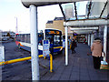 A bus from Lossiemouth having arrived at Elgin bus station