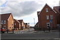 SK3771 : Modern housing of Spire Heights at Cross Road junction by Roger Templeman