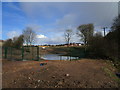 Pond and perimeter fence, Sherwood Forest Golf Club