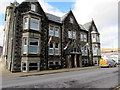 Welsh flags on a Station Road building, Treorchy