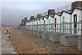 Beach huts on the promenade at Seaford