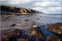 NH7459 : Rocks and seaweed near Scart Craig by Julian Paren