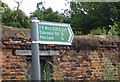 TQ5786 : Footpath Sign at Cranham Village by Sean Davis
