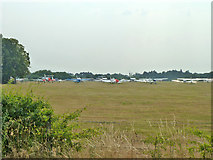 TQ0388 : Parked aircraft, Denham Aerodrome by Robin Webster