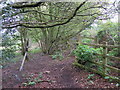 Stile and abandoned roadsign at the end of Sandy Lane