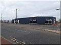 NZ2666 : Former car dealership, Benton Road by Graham Robson