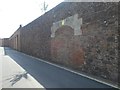 Bricked up arch, wall of Exeter Prison