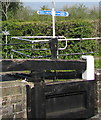 ST3090 : Canalside signpost near Bettws Lane, Newport by Jaggery